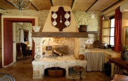 the welcoming fireplace in the Dining/Living Area