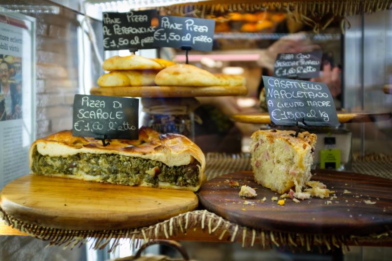 pizza di scarola in a Naples shop window