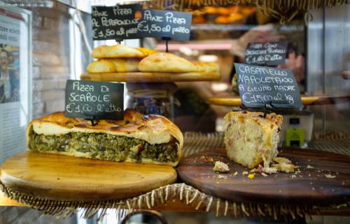 pizza di scarola in a Naples shop window