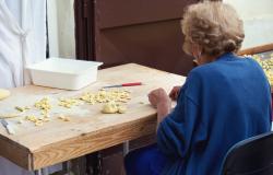 Woman making traditional orecchiette pasta in Bari, Puglia